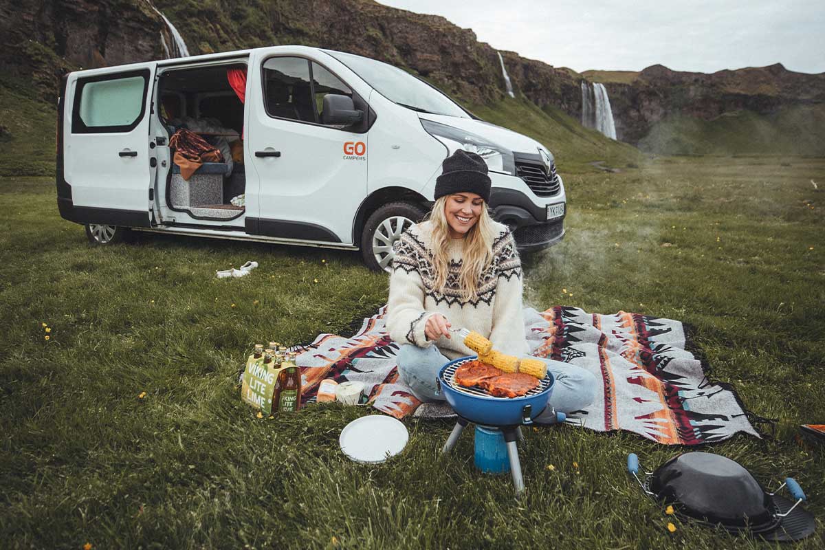Woman camping in iceland