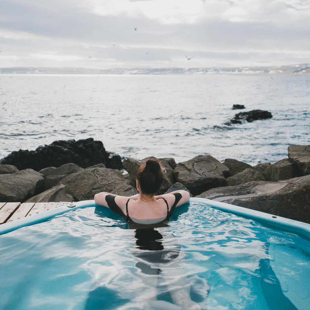 A woman in a swimming pool in Iceland 