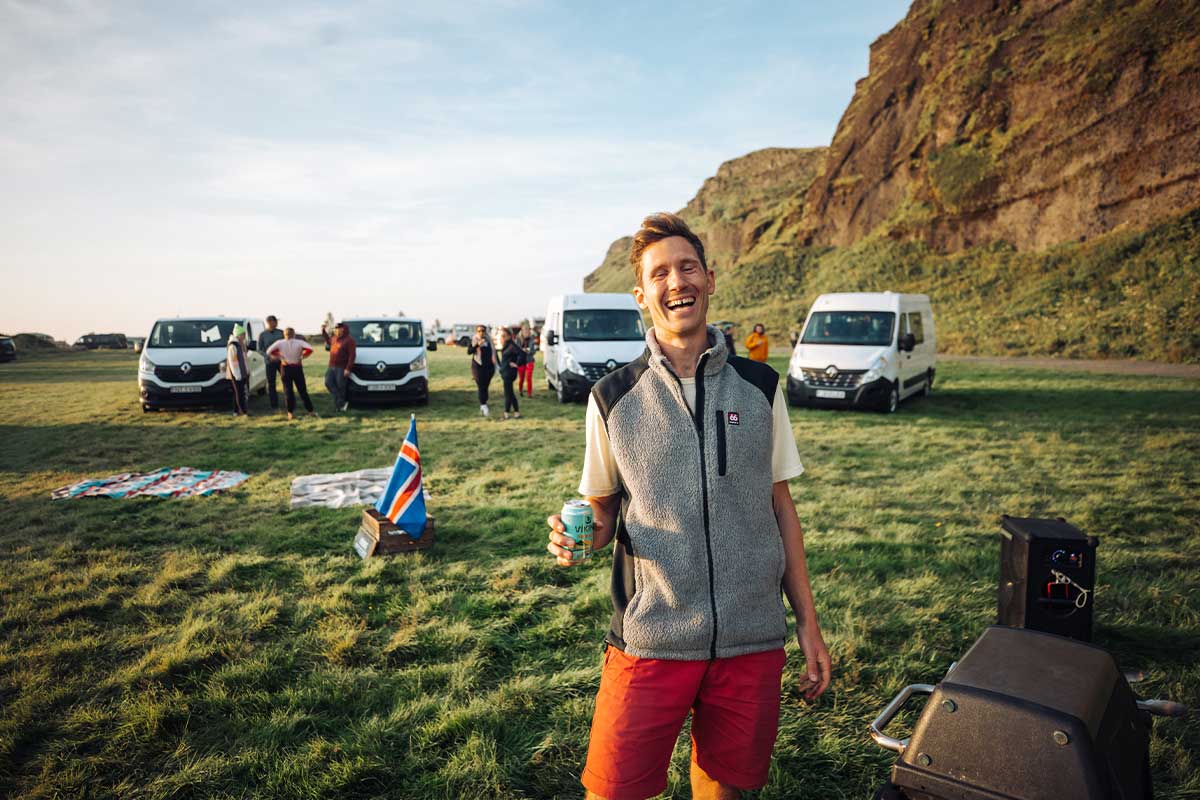 Happy man at a campsite in iceland