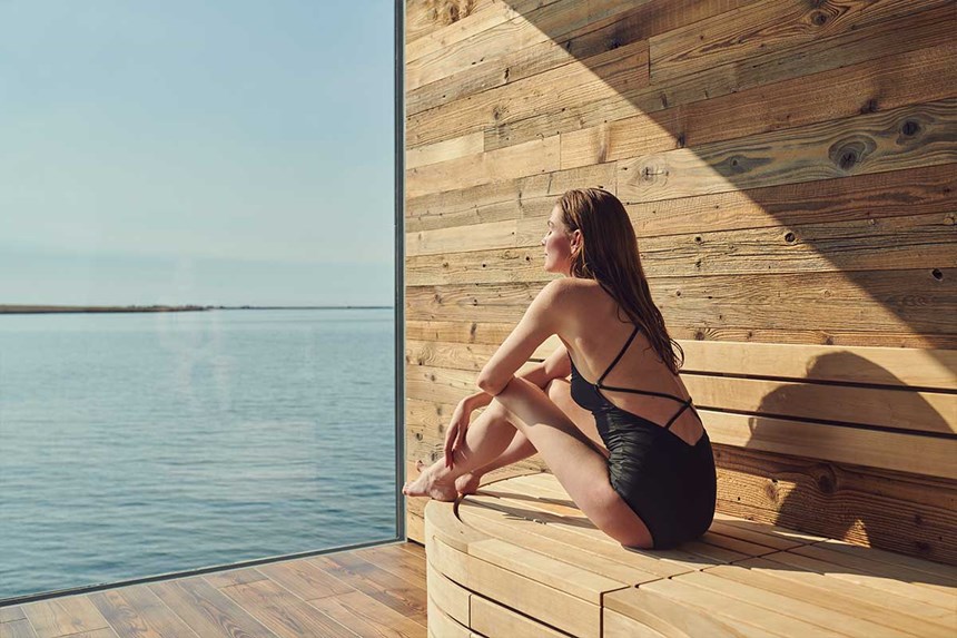 A woman in the sauna in Sky Lagoon in Iceland